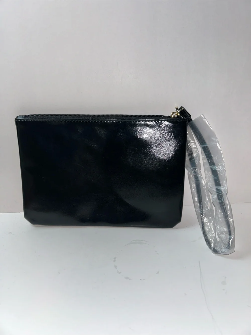 Victoria's Secret Floating Confetti Sequin Wristlet Pouch.
